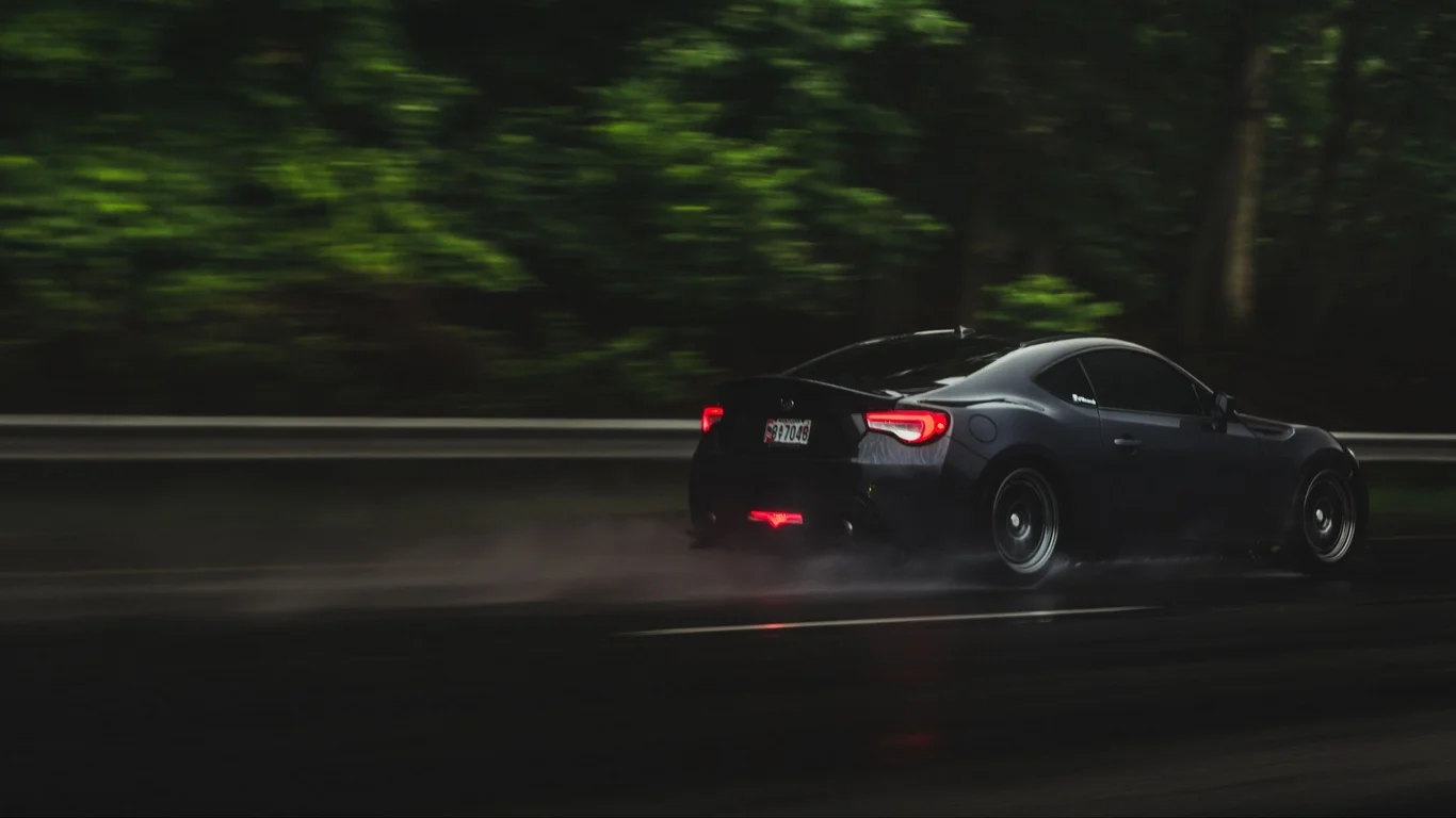 18800 car road speed rain 4k